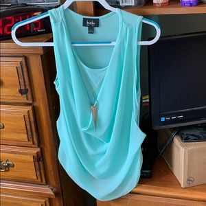 Teal tank top with striped matching sweater